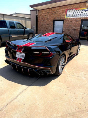 Close-up of 2024 Corvette C8 Z51 rear RVRN RV-DC04 wheel, highlighting brushed aluminum spokes, carbon flash metallic barrel, and RVRN red screws