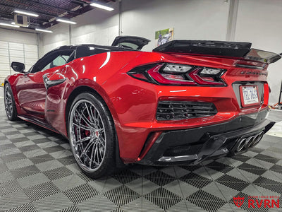 Close-up of chrome forged wheel spokes on C8 Z06, custom Corvette wheels with precision machining