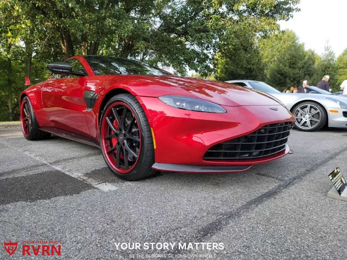Aston Martin V8 Vantage in red with RVRN carbon fiber rims showcasing sporty design and luxury aesthetics.