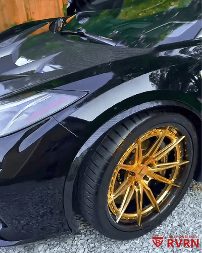 Detail shot of RVRN forged carbon fiber wheels mounted on black 2025 Corvette C8 E-Ray