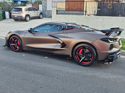 Rear fitment of 20x11 forged red and black rims on Corvette C8 Z51, custom aftermarket wheels for aggressive stance
