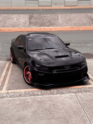 Front view of a black 2023 Dodge Charger Redeye Widebody on RVRN RV-DC39 deep dish rose gold polished wheels in a parking lot