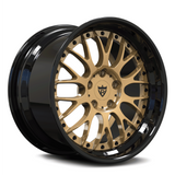 Custom 2-piece deep lip forged wheel with gold spoke design and black finish for luxury cars.