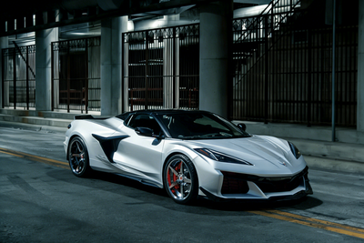 RVRN DF14 custom forged chrome wheels installed on 2026 Corvette C8 E-Ray aggressive stance fitment