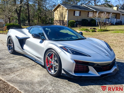 Close-up of RVRN DF14 forged 5-spoke chrome wheel on 2026 Corvette C8 E-Ray front 20x10