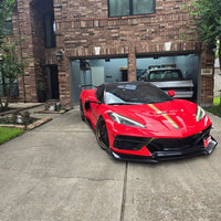 Custom Corvette C8 Stingray with matte bronze RVRN forged wheels in front of a house, showcasing 5 spoke upgrade.