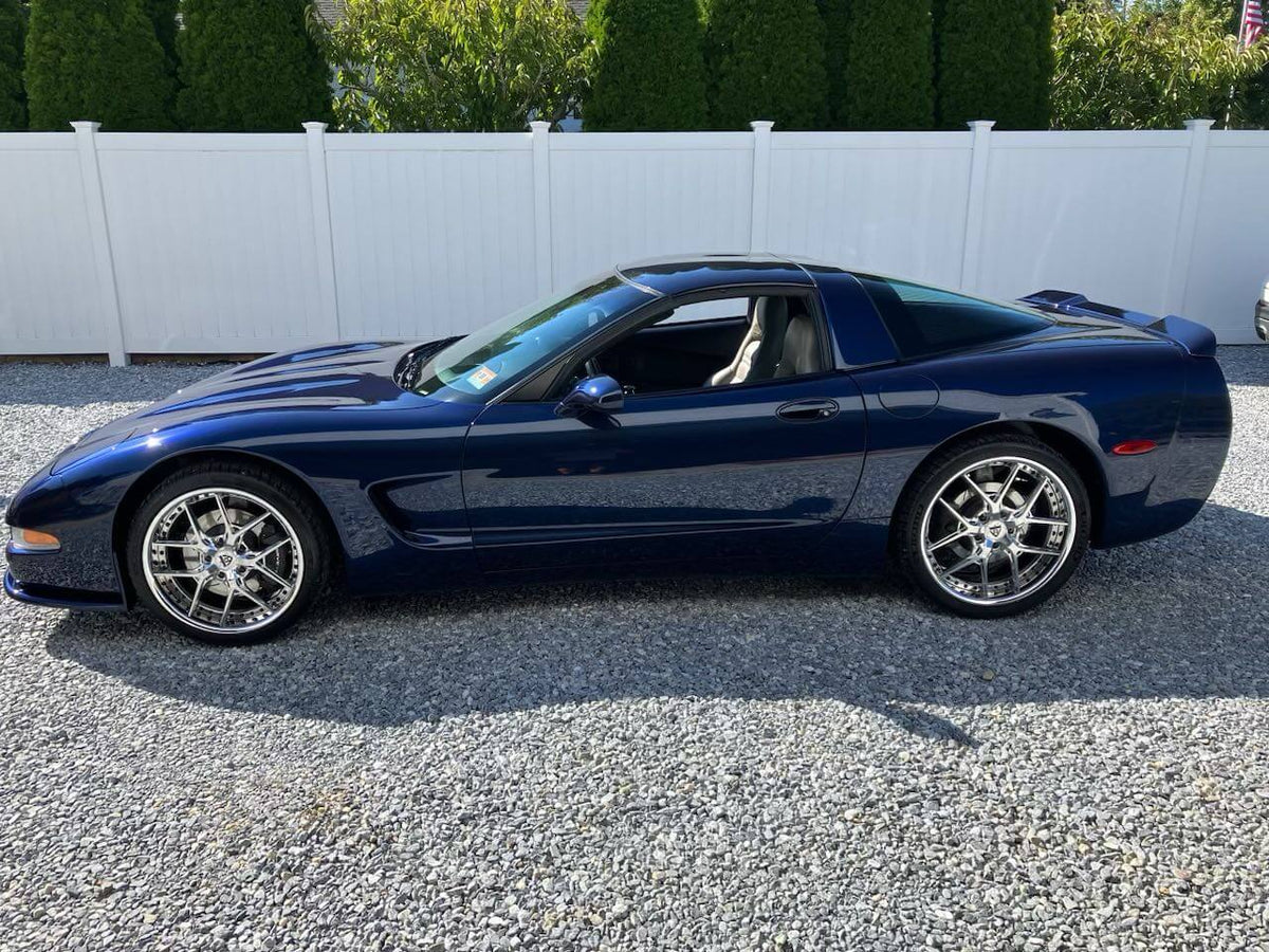 2000 Chevrolet Corvette C5 sitting on RVRN Forged Wheels RV-DR08, chrome polished aluminum with deep lip, staggered setup 19x9.5 front and 20x10 rear.