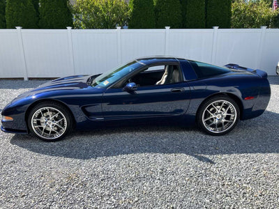 2000 Chevrolet Corvette C5 sitting on RVRN Forged Wheels RV-DR08, chrome polished aluminum with deep lip, staggered setup 19x9.5 front and 20x10 rear.