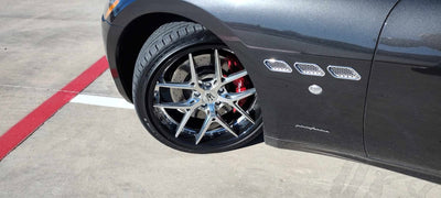Close-up spoke detail of forged wheel on Maserati Granturismo, precision machining and custom wheel design