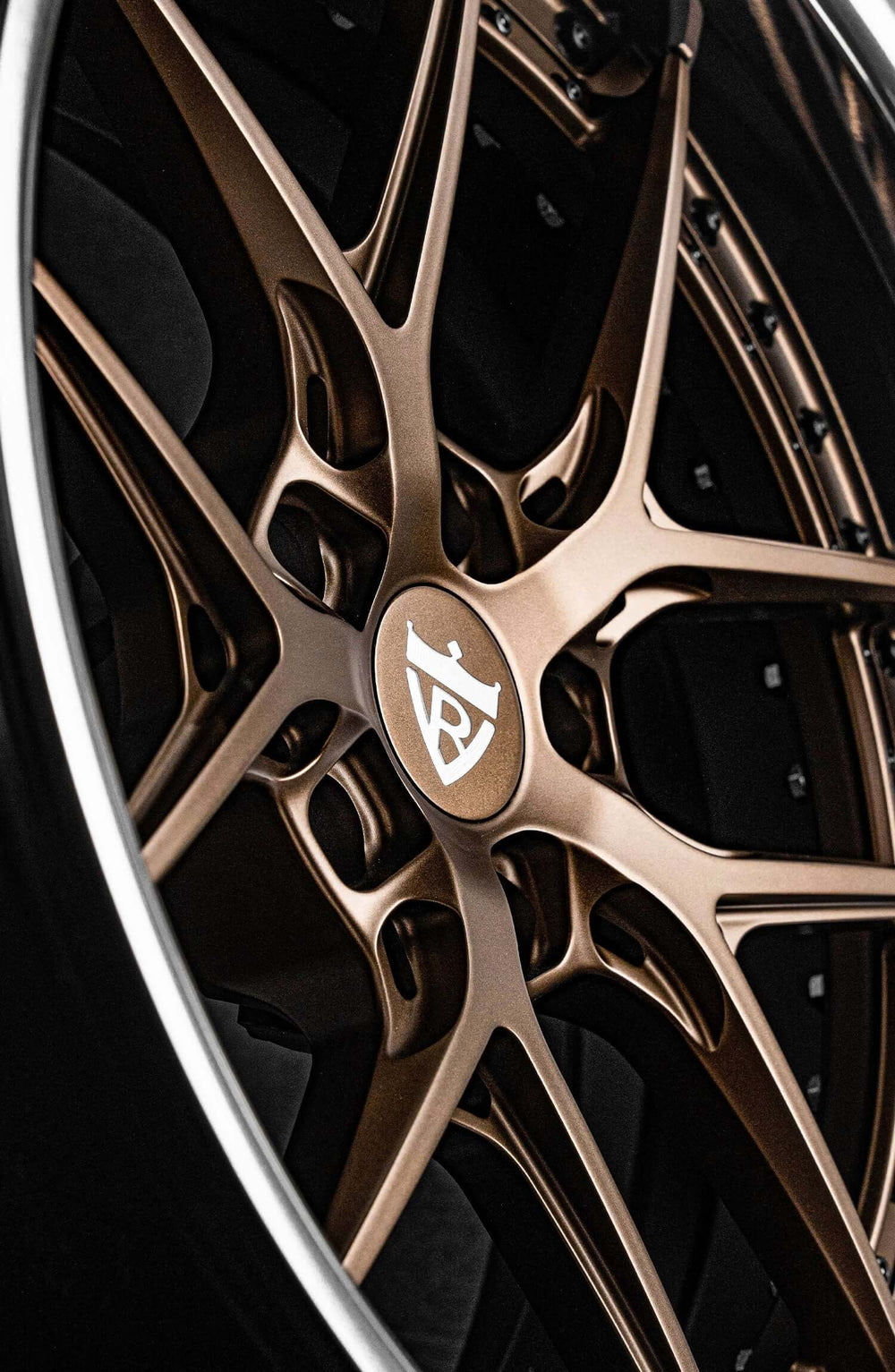 Custom bronze wheels for 1972 Chevy C10 featuring a deep dish design and intricate spoke pattern.