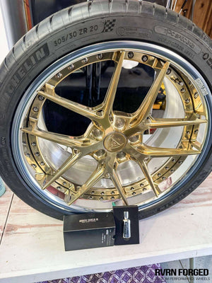 Close-up of the RVRN RV-DR08 polished frozen gold forged wheel with polished aluminum barrel and chrome screws on a 2020 Corvette C8 Z51