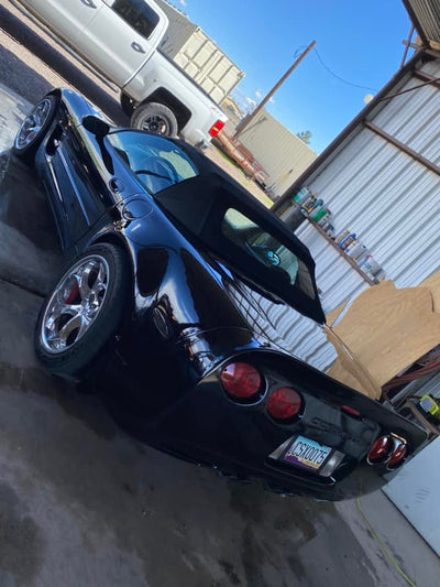 2000 Corvette C5 convertible with polished aluminum wheels and RVRN custom forged wheels.