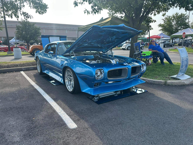1973 Pontiac Trans Am with custom forged wheels and super deep dish rims at car show, showcasing best build.