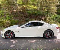 2018 Maserati GranTurismo with custom 20-inch staggered RVRN forged RV-DV03 wheels and red brake calipers.