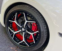20-inch staggered RVRN forged RV-DV03 Series custom wheels on a 2018 Maserati GranTurismo with red brake calipers.