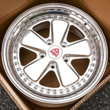 Custom forged 5 spoke deep dish wheel for Porsche 911, showcasing polished finish and intricate design.