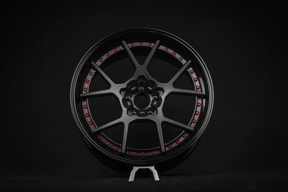 Black and red custom forged RV-DF04 wheel by RVRN Wheels designed for Ford Mustang GT.