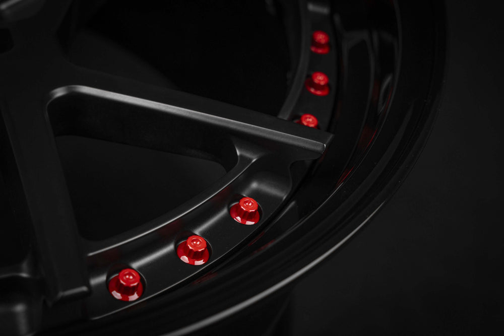 Close-up of black and red custom forged wheel for Ford Mustang GT, RV-DF02, by RVRN Wheels.
