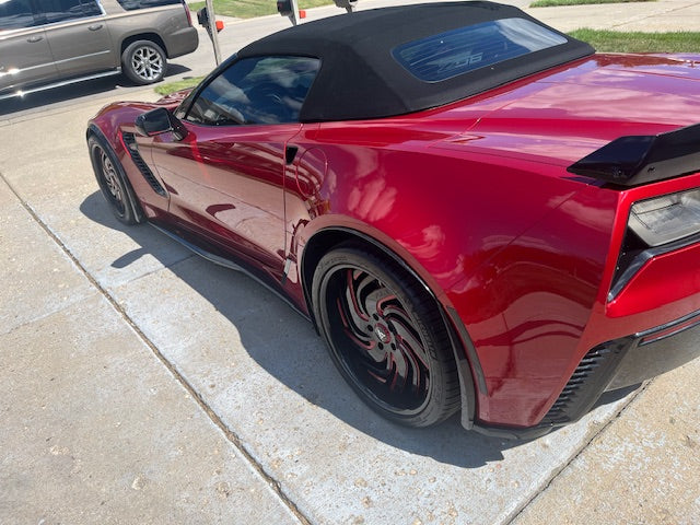 Red Corvette C7 Z06 650PLUS car parked on a driveway