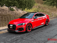 2019 Audi RS5 in striking red with custom black wheels, featuring a 20x9 RVRN forged wheel setup.