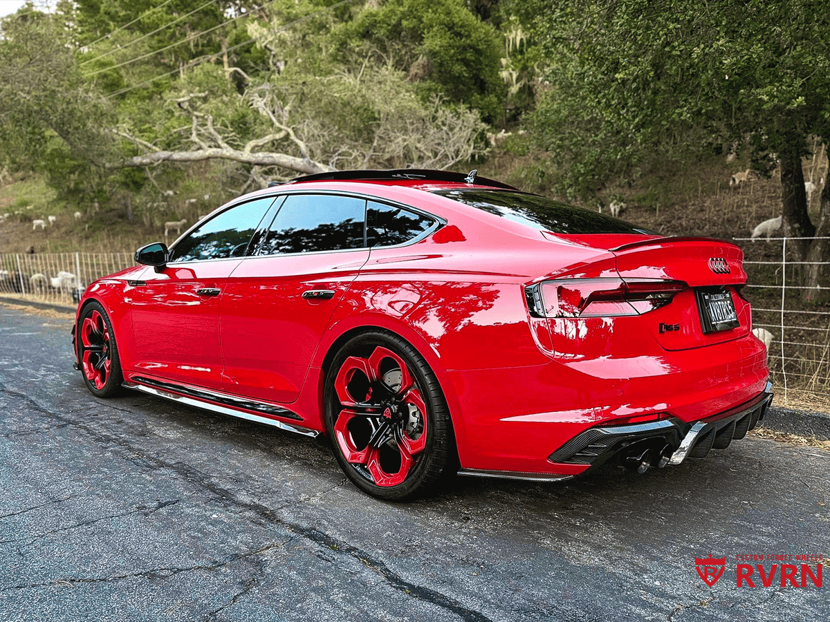 2019 Audi RS5 in red with black custom 20x9 RVRN forged wheels, showcasing its sporty design and performance.
