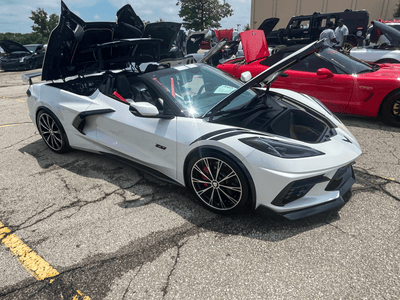 Front angle of 2023 Corvette C8 Stingray Z51 with RVRN MA61 custom forged wheels, 19x8.5 / 20x11 setup, black finish highlighting concave design.