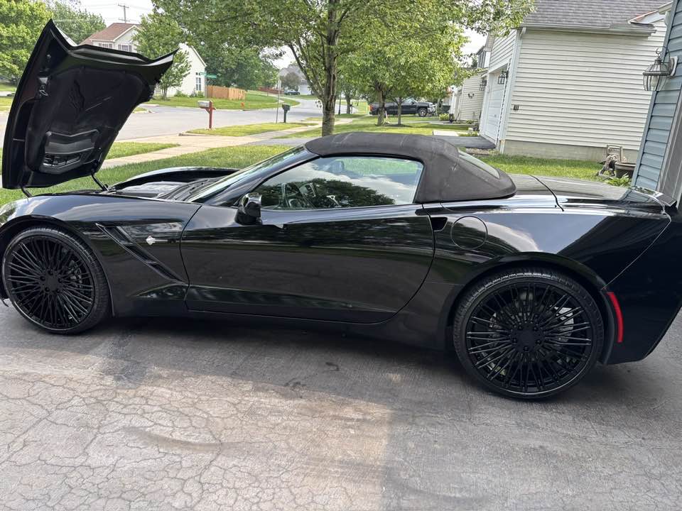Corvette C7 Stingray with gloss black forged wheels, 21" & 22" staggered, showcasing sleek design and performance.