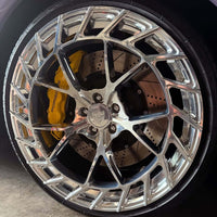 Front quarter view of 2018 Audi SQ5 on RVRN MC23 forged wheels, 21x10 polished aluminum, highlighting concave 5-spoke design and aggressive fitment.