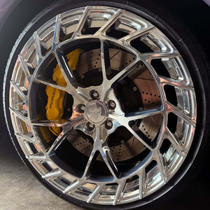 Front quarter view of 2018 Audi SQ5 on RVRN MC23 forged wheels, 21x10 polished aluminum, highlighting concave 5-spoke design and aggressive fitment.