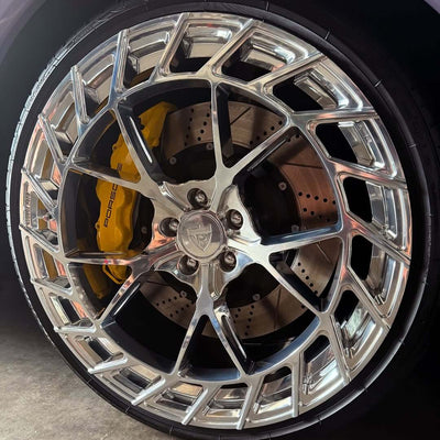 Front quarter view of 2018 Audi SQ5 on RVRN MC23 forged wheels, 21x10 polished aluminum, highlighting concave 5-spoke design and aggressive fitment.