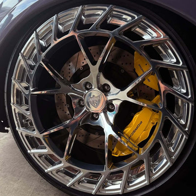 Detail shot of RVRN MC23 wheel mounted on 2018 Audi SQ5, 21x10, emphasizing polished aluminum finish, deep concave lip, and precise craftsmanship.