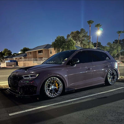 Angle shot of Audi SQ5 with MC23 polished aluminum wheels, showcasing both front and rear wheel stance and premium forged finish.