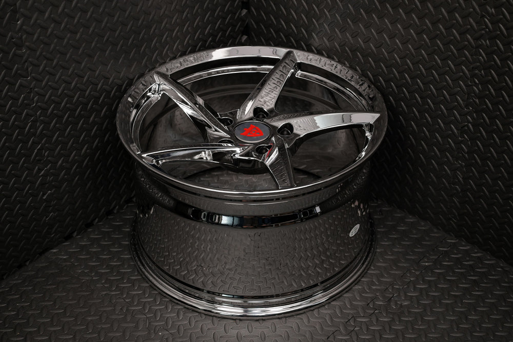 Aftermarket chrome 5 spoke rim for Porsche 911 wheels, showcasing a sleek design and polished finish.