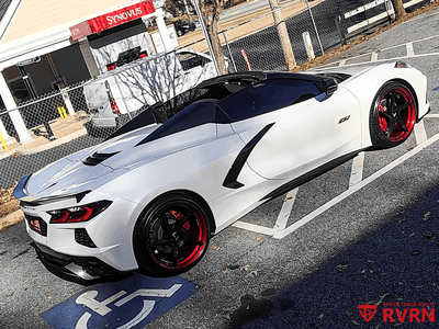 Side profile of white Corvette C8 Z51 featuring RVRN MC35 custom forged wheels 20x9 21x12 staggered setup