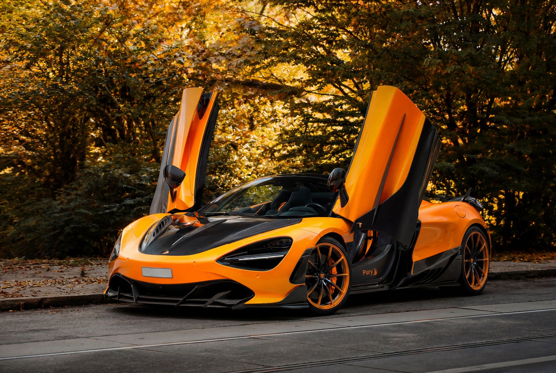 McLaren 720S with orange forged wheels featuring a multi-spoke design