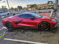 Rear three-quarter view of 2025 C8 Stingray showing aggressive wheel stance