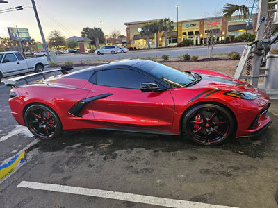 Rear three-quarter view of 2025 C8 Stingray showing aggressive wheel stance
