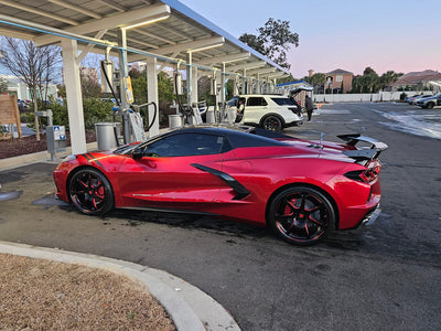  Close up of red and black RVRN custom forged wheel on Corvette C8