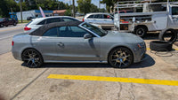 2014 Audi RS5 with custom forged performance wheels and a sleek 20x9 setup parked on the street.