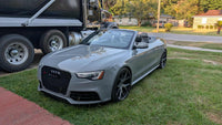 2014 Audi RS5 convertible in gray with custom 20x9 forged performance wheels parked on grass.