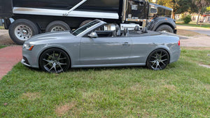 2014 Audi RS5 convertible with custom forged rvrn RV-MR05 wheels, 20x9 setup, parked on grass.