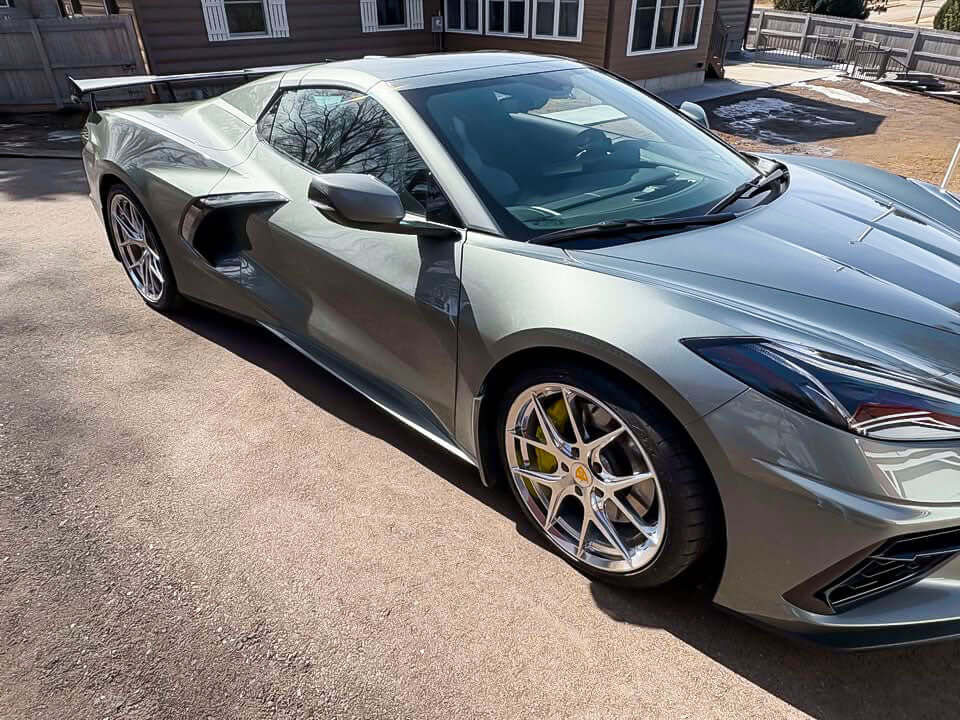 2022 Corvette C8 Z51 HTC in silver with custom polished aluminum rims and sporty profile.