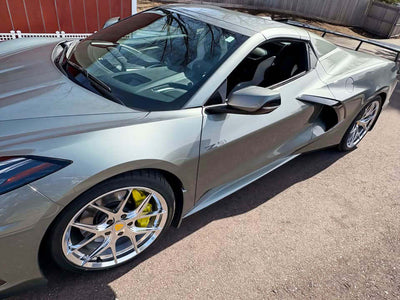 2022 Corvette C8 Z51 HTC with custom polished aluminum rims showcasing sporty design and performance features.