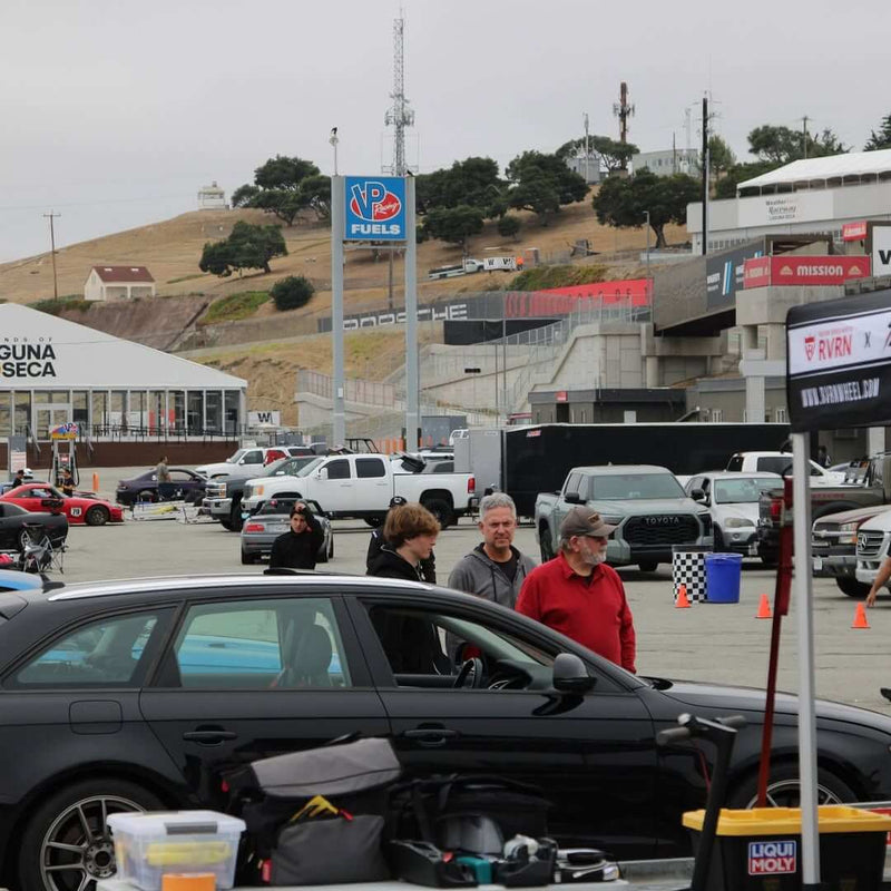 Porsche Cayman T with RVRN forged wheels at Laguna Seca 2025, showcasing performance and lightweight aluminum design.