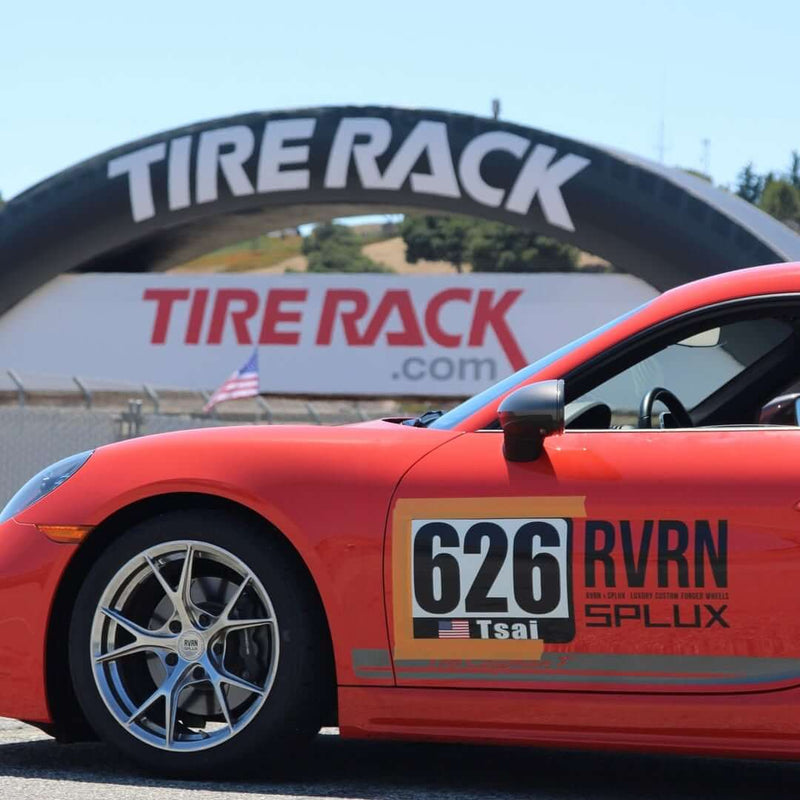 Porsche Cayman T with RVRN forged wheels on track at Laguna Seca, showcasing lightweight performance and custom design.