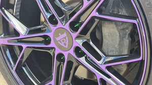 Close-up of purple and black C7 forged wheels on a 2015 Corvette Stingray, featuring RVRN RV-MR20 series design.