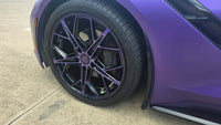 Close-up of a purple and black wheel on a 2015 Corvette C7 Stingray with RVRN RV-MR20 series design.