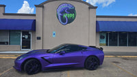 2015 Corvette C7 Stingray in purple with black RVRN RV-MR20 forged wheels outside a store.