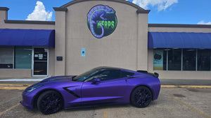 2015 Corvette C7 Stingray in purple with black RVRN RV-MR20 forged wheels outside a store.