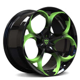 Custom forged monoblock wheel in black and green finish, designed for Tesla Model S with max concavity for brake clearance.